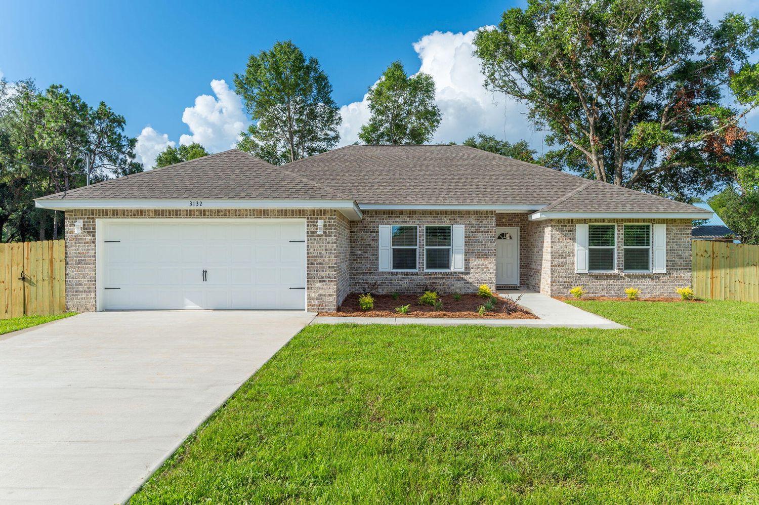 Brick home with attached garage on Holley Avenue, Crestview