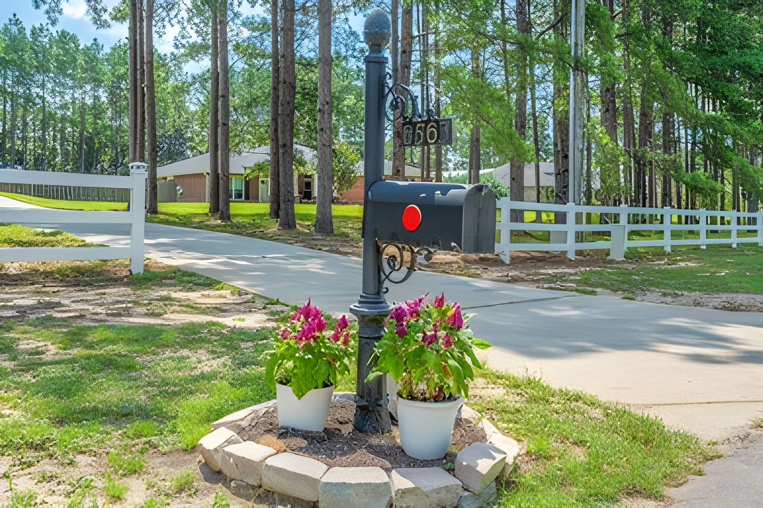 Mailbox and flower planters at the entrance to a Crestview, Florida home